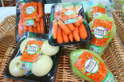 农博会有机食品人气旺，扫描二维码可‘验明正身’生鲜食品